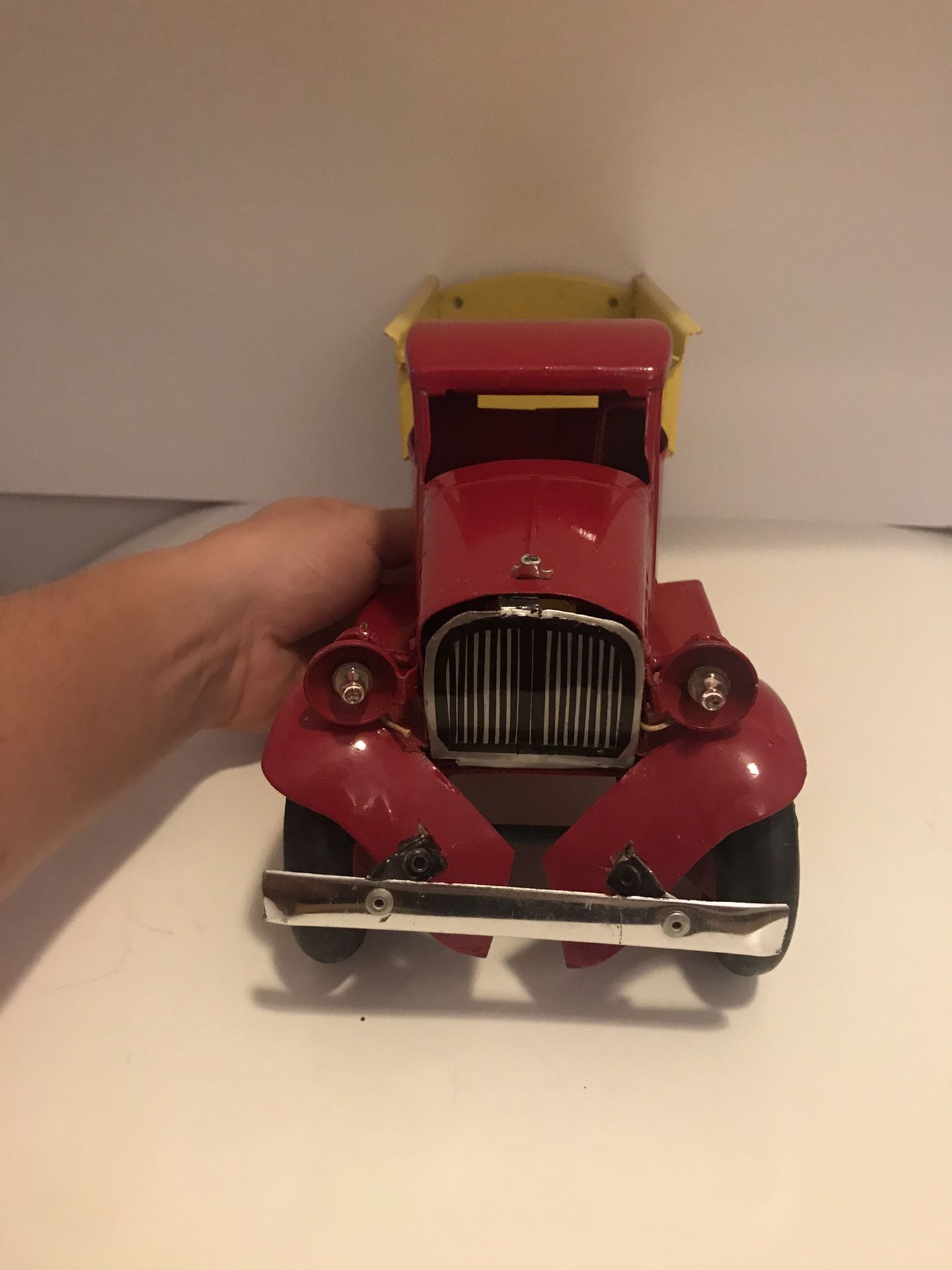 Vintage and Rare Turner Toys Pressed Metal Red and Yellow Dump Truck with Battery Slot for Working Headlights 18in Length 6in Height Normal Wear Rubb
