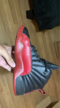 Black and red Jordan retro 12’s