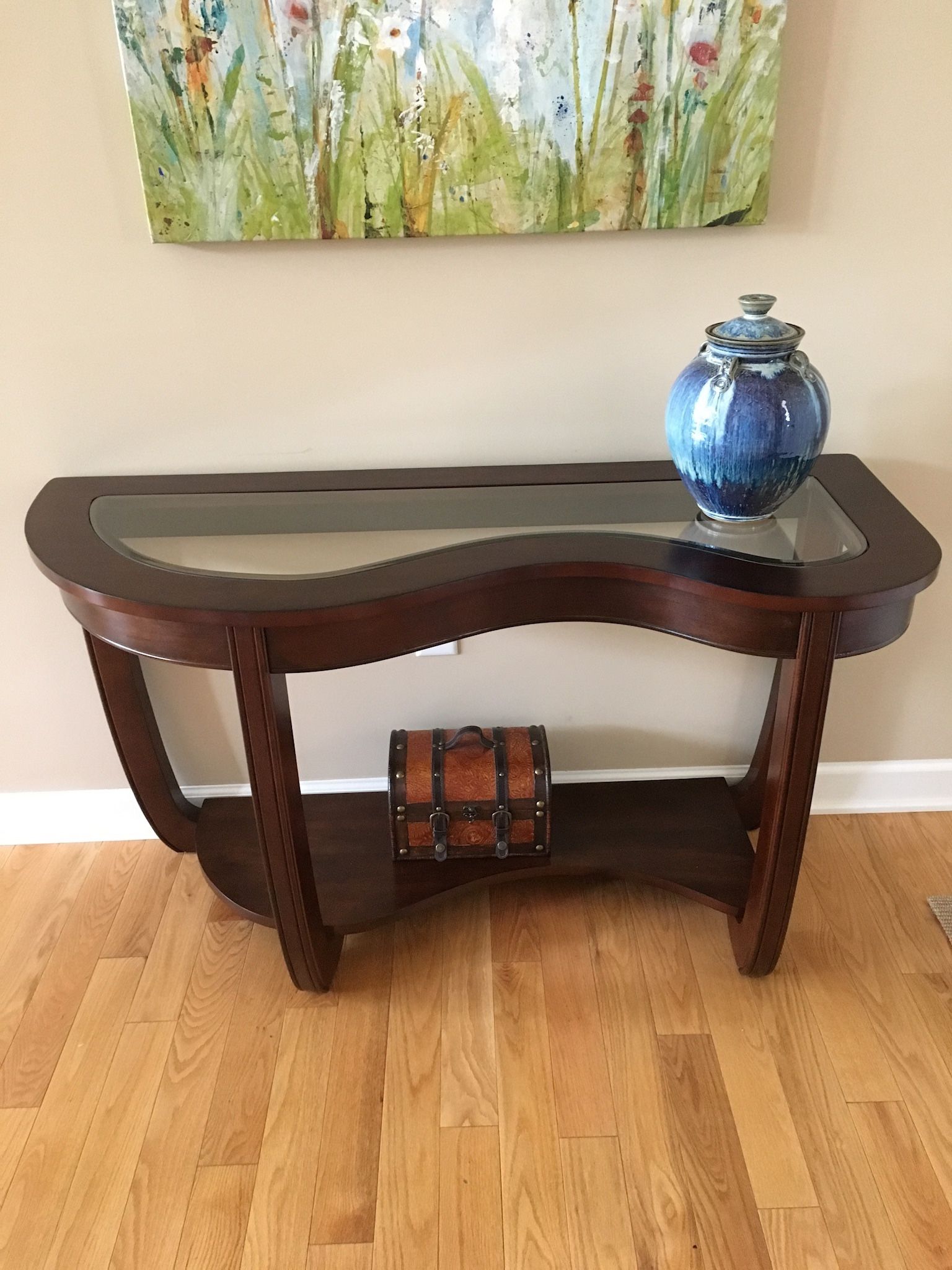 Glass top console table