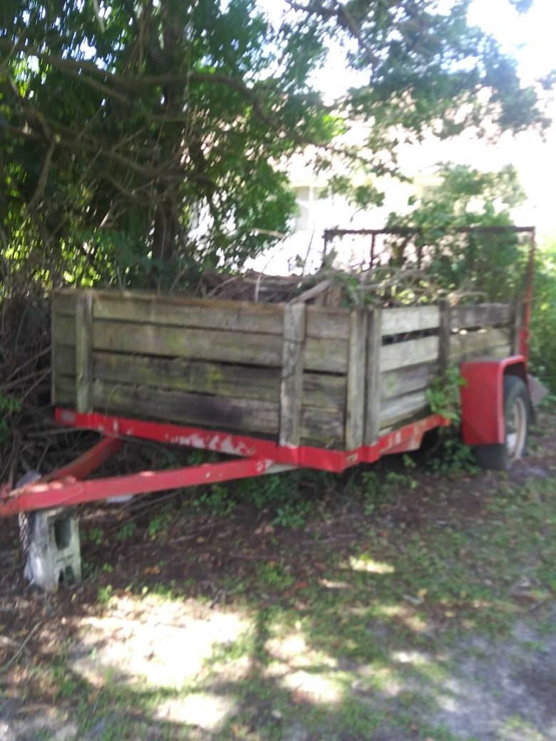 Utility trailer with drop ramp