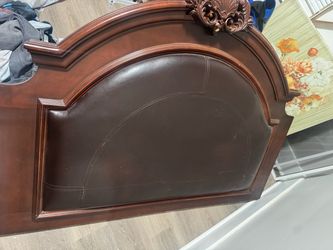 Ornate Wood and Leather Upholstered Headboard