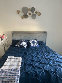Queen bed frame with phone charger