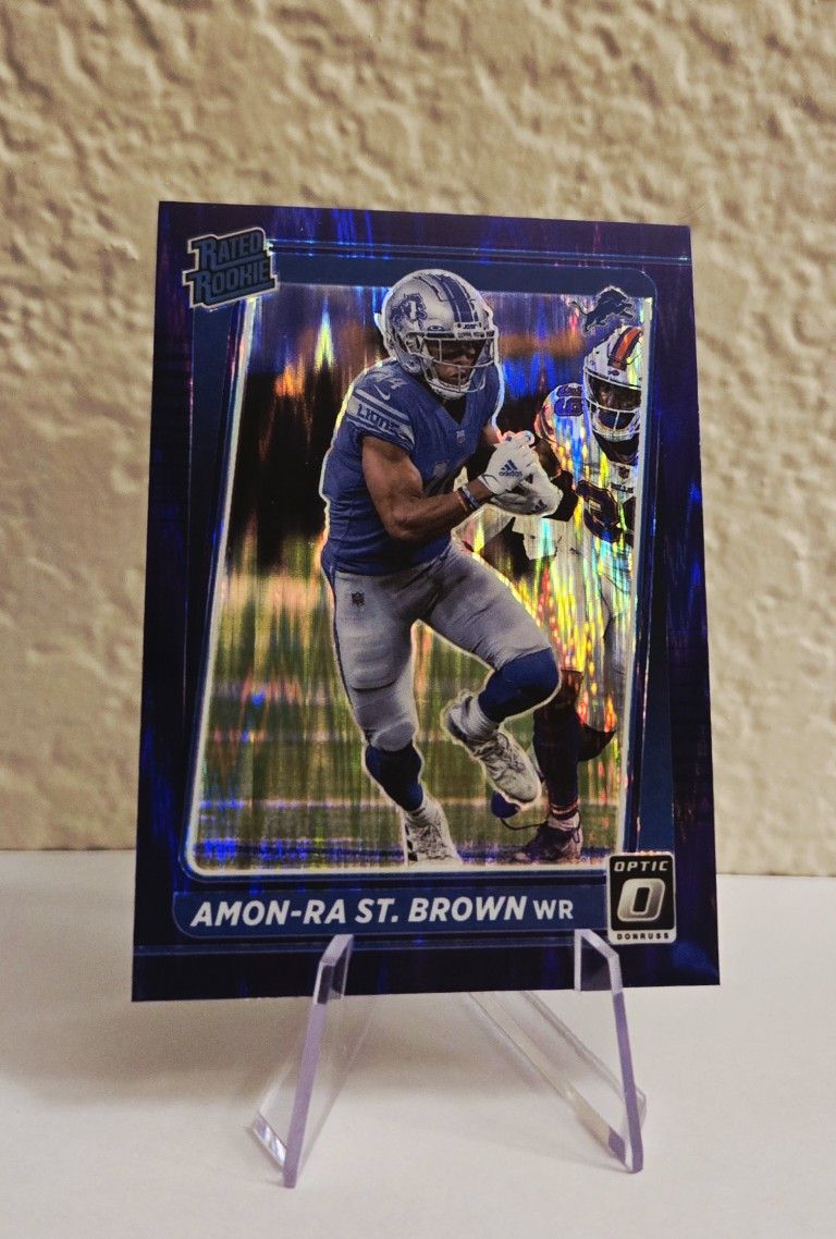 Amon-Ra St. Brown#228 Purple Shock Prizm 2021 Donruss Optic Rated Rookie Lions