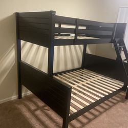 Twin/full bunk bed. Available in espresso & white. Assembly required. Assembly not included. Tax included. Free local delivery. $350 bunk bed only. $5