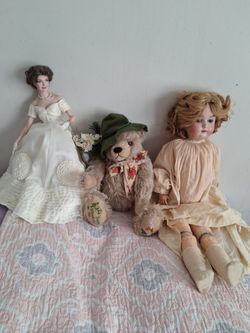 Vintage  porcelain bisque doll and Herman mohair bear