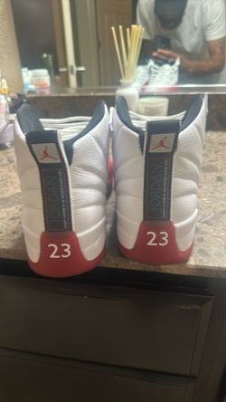 Cherry And White Jordan 12’s