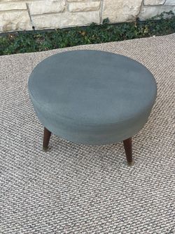 Gray footstool/ottoman