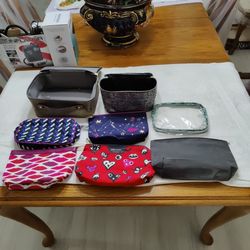 Assorted Makeup Cases For Your Purse Or Travel Located  In Palm Beach Gardens.l