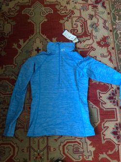 Under armor cold gear quarter zip pull over.