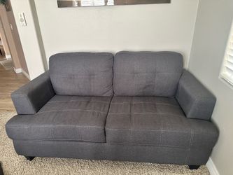 Gray loveseat couch