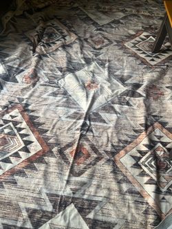 Rug. NEW. 9x12.  Aztec/Southwest print  washable