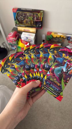11 sleeved booster packs of Phantasmal flames