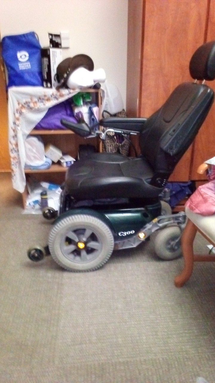 Permobil C300 Dark Green Wheelchair.