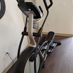 Elliptical Training Exercising Machine