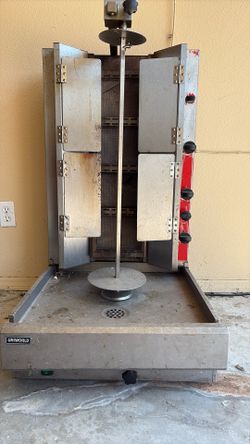 Vertical roaster for spinning top meat