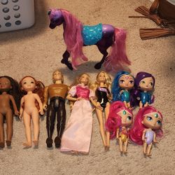 Assorted Dolls and Toy Unicorn