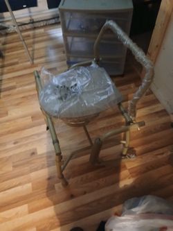 BRAND NEW ! Drop arm commode