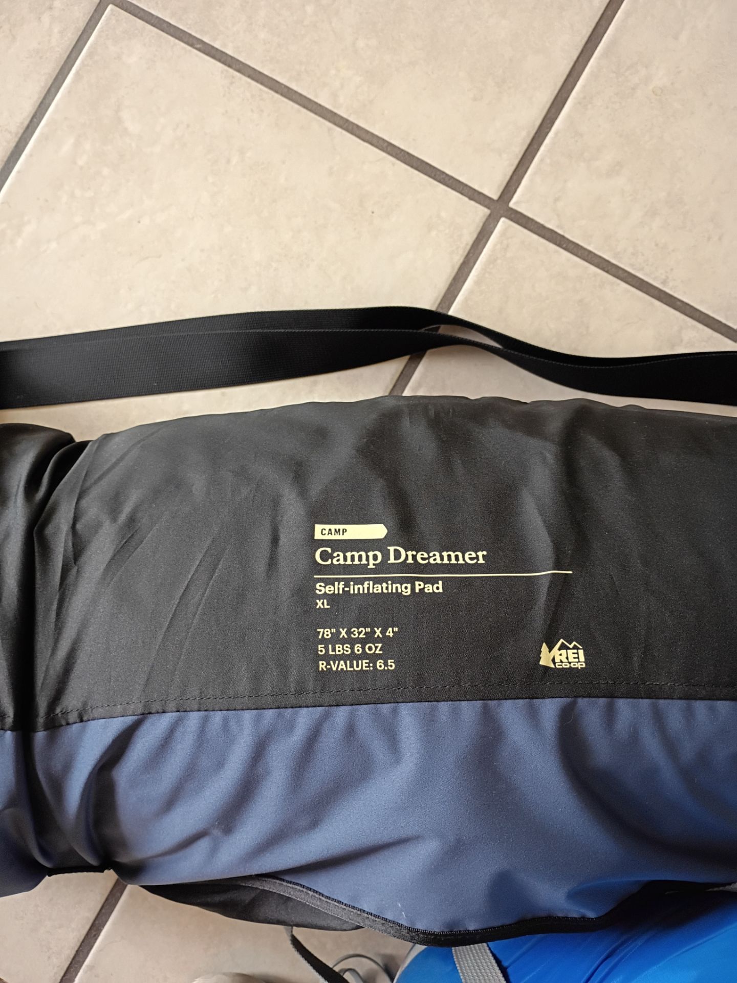 REI sleeping bag and thick foam mat