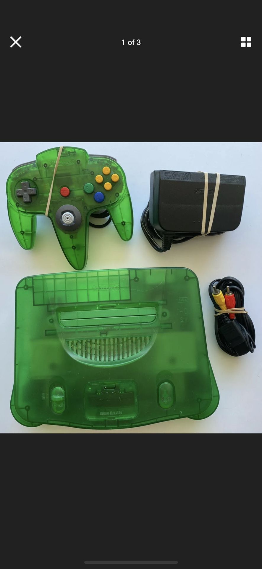 Nintendo jungle green n64 with expansion pack.