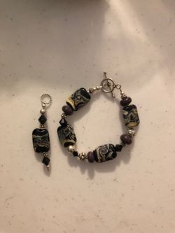 Chico’s bracelet and necklace pendant