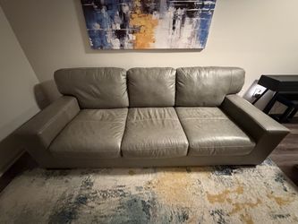 Beautiful Ashley Furniture Lombardia leather sofa in the elegant Fossil color.
