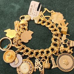 14 Karat Yellow Gold Charm Bracelet