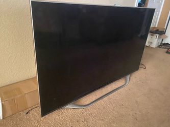 60 inch Samsung TV with chrome stick