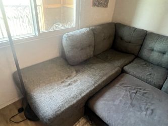 Pull out bed gray sectional