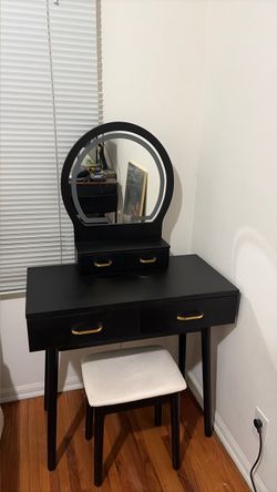Black vanity table with stool