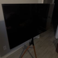LG 49UM3DG-B 49” Commercial Display + Modern Easel Stand – Sold As-Is