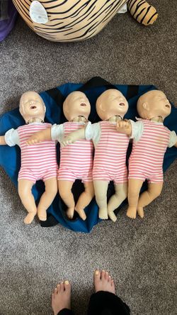 4 infant CPR mannequins Laerdal