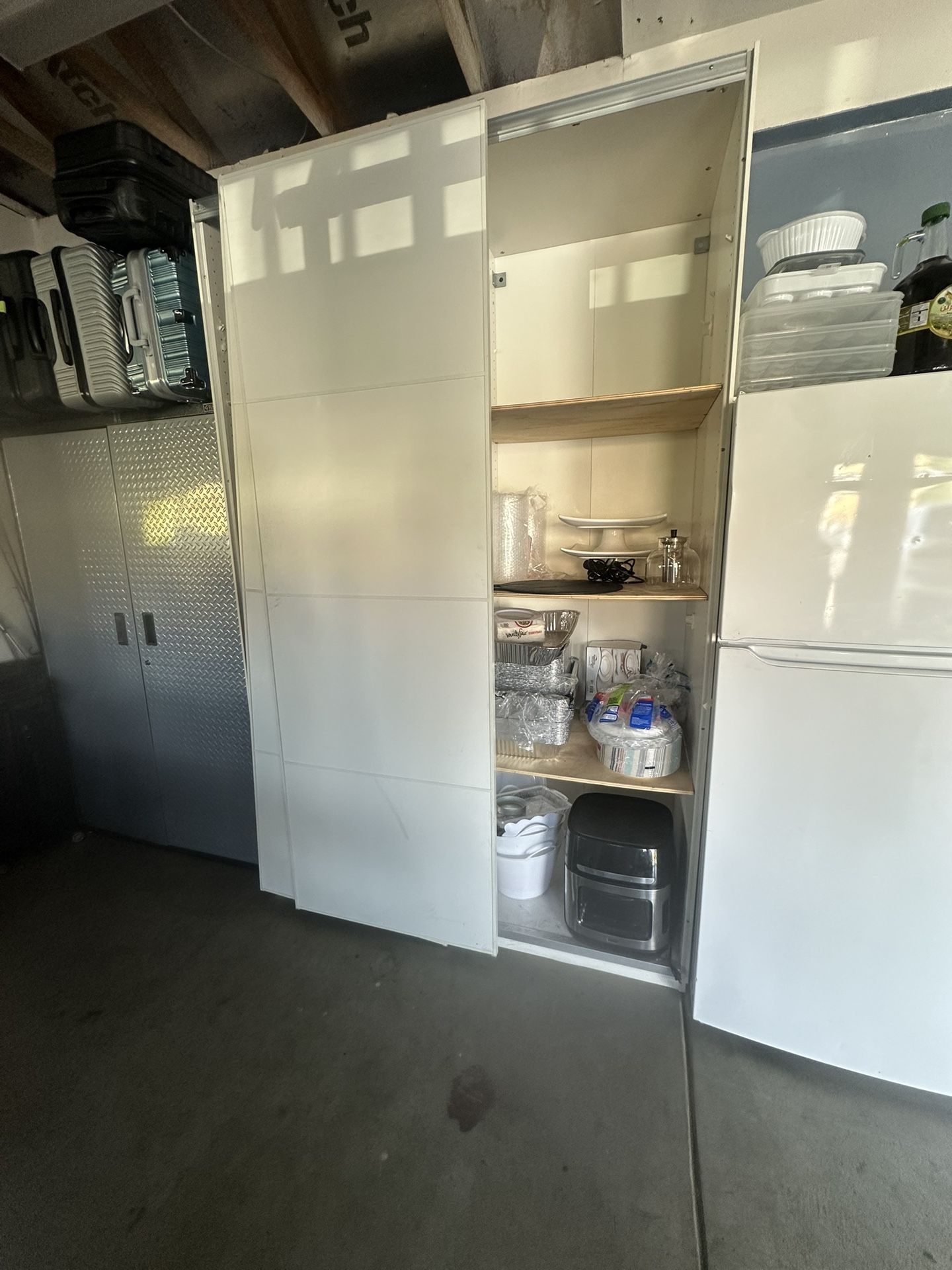 Large Storage Cabinet with Shelves – $20 (Loose Door)