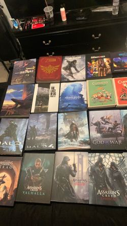LOT OF MOVIE/VIDEO GAME ART BOOKS…