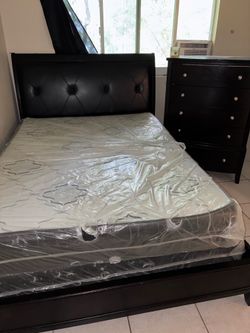 Queen size bed and tall dresser with mattress and box spring