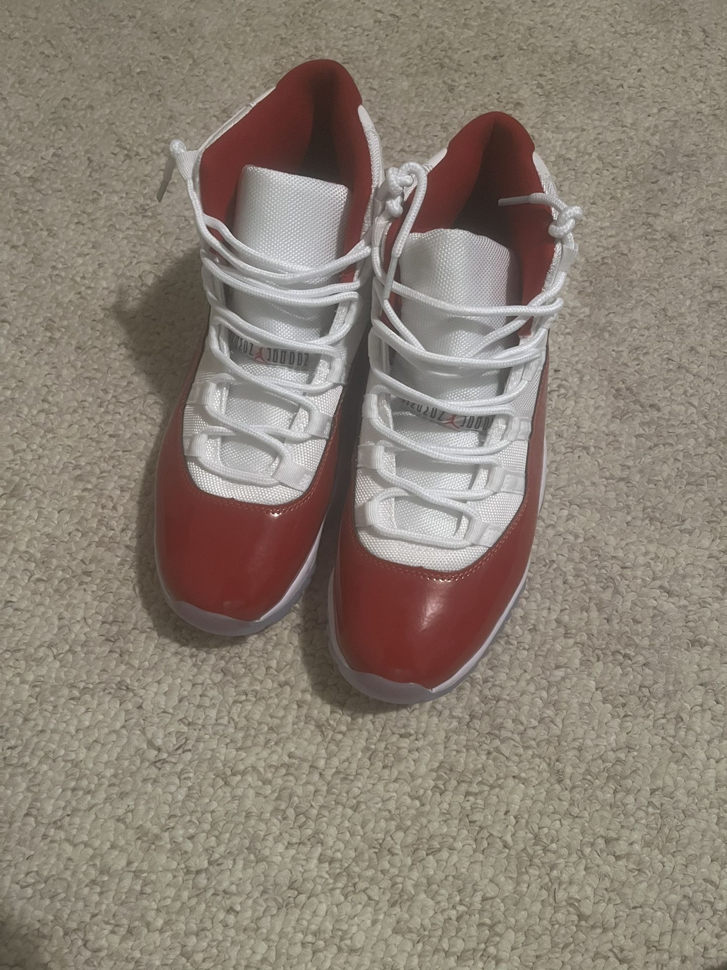 Jordan 11 Cherry 