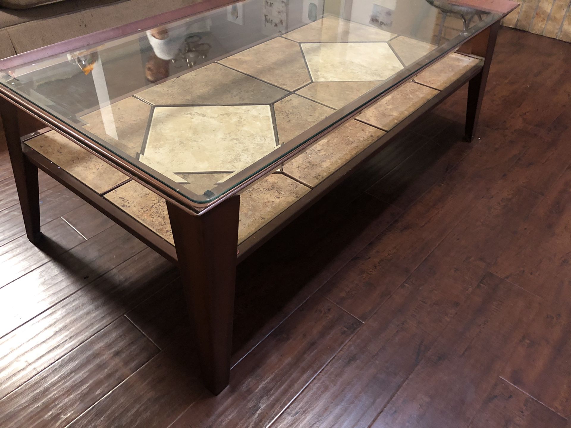 Glass (removable) top coffee table with metal frame.