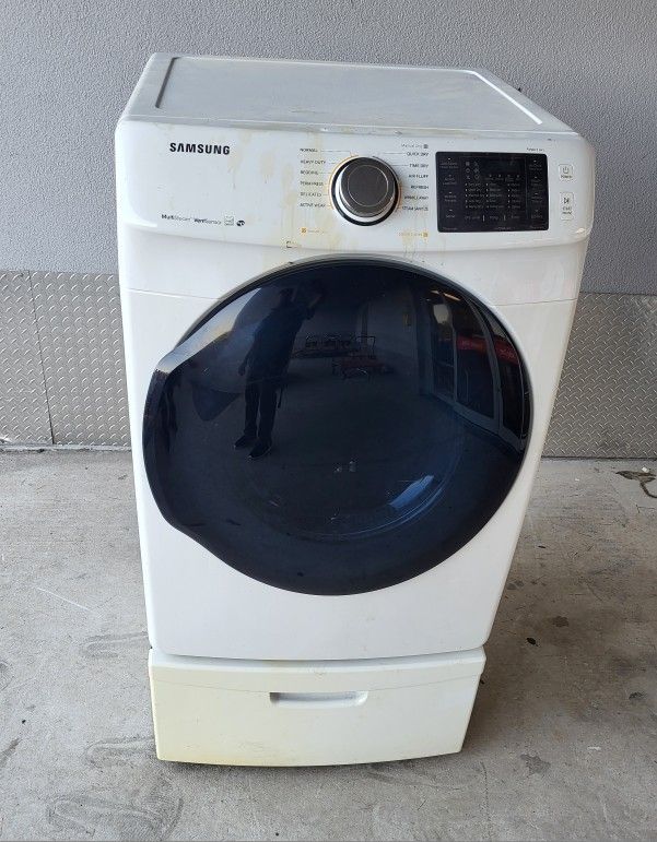 Samsung Front Load Dryer:ELECTRIC, ON PEDESTAL, WORKS GREAT, LARGE CAPACITY, HAS SOME DISCOLORATION ON THE EXTERIOR;REASON FOR THE LOW PRICE 