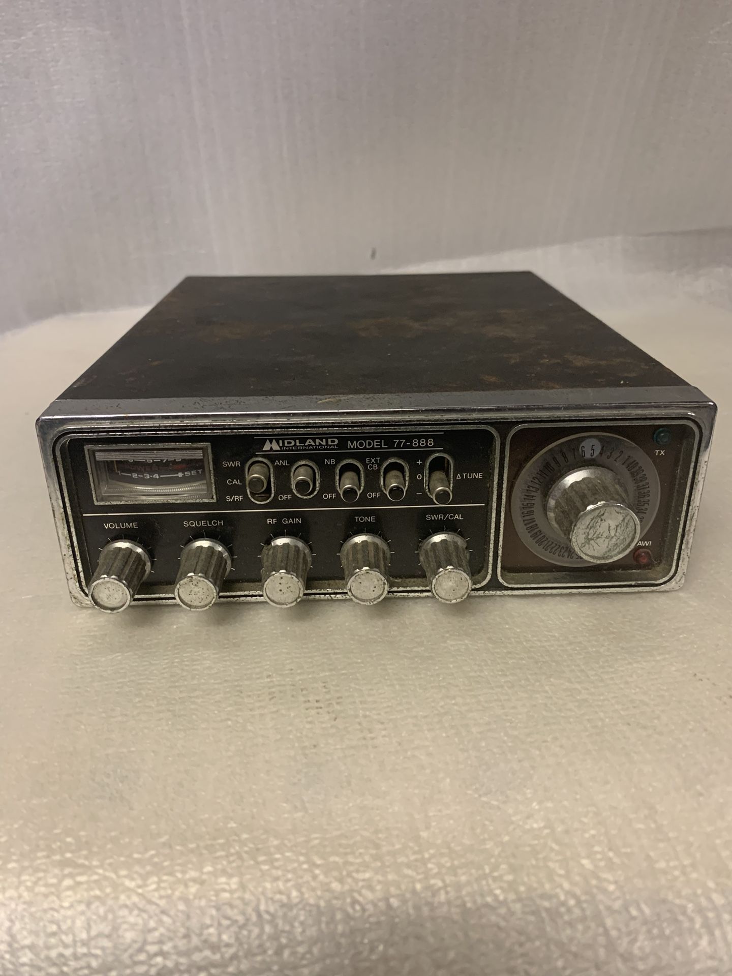 Midland CB Radio, specifically the Model 77-888 or the 75-822. It's a 40-channel CB radio designed for both mobile and portable use.