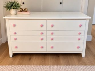Spacious 6 drawer white dresser with pink knobs