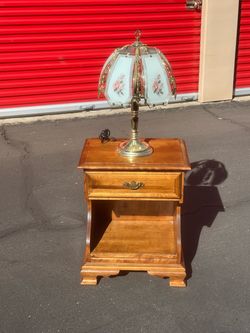 Antique end table and decorative lamp
