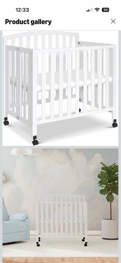 White mini crib