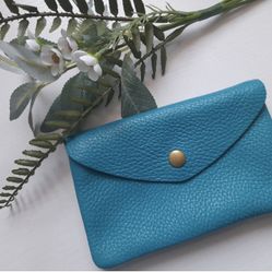 Fine Italian Soft Pebble Leather Coin & Credit Card Wallet 6"X4". Sky Blue. 3 Compartments Zippered. Brass Hardware. Simple Elegance!

Softest Leather