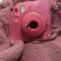 pink Fujifilm Instax Mini 9 instant camera, 