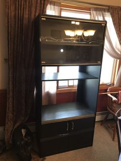 Blk and gold entertainment center