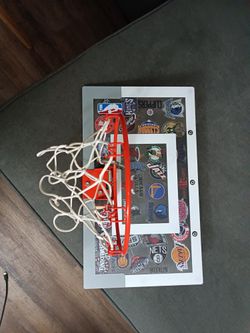 Spalding in house basketball hoop with ball