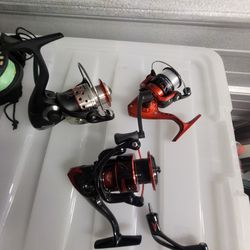 (3) Fishing Rods And (3) Reels With Line