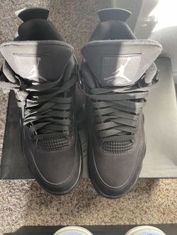 Black Cat Jordan 4’s