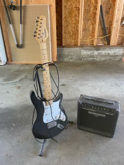 Electric guitar with amp and stand