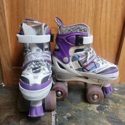 Girls skates , adjustable  size 10-13
