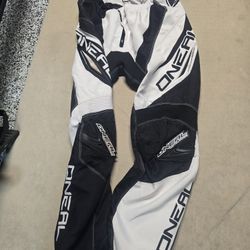 Older Used White And Black Dirt Bike Pants- O'Neal 